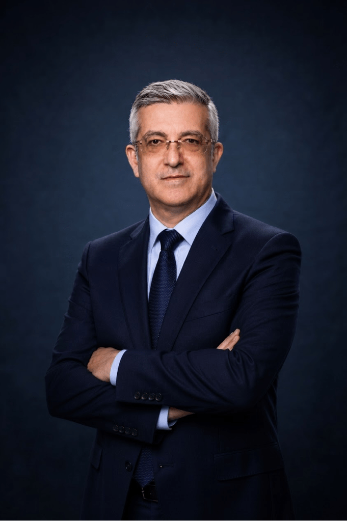 Prof Kyriakos