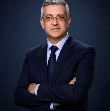 Prof Kyriakos