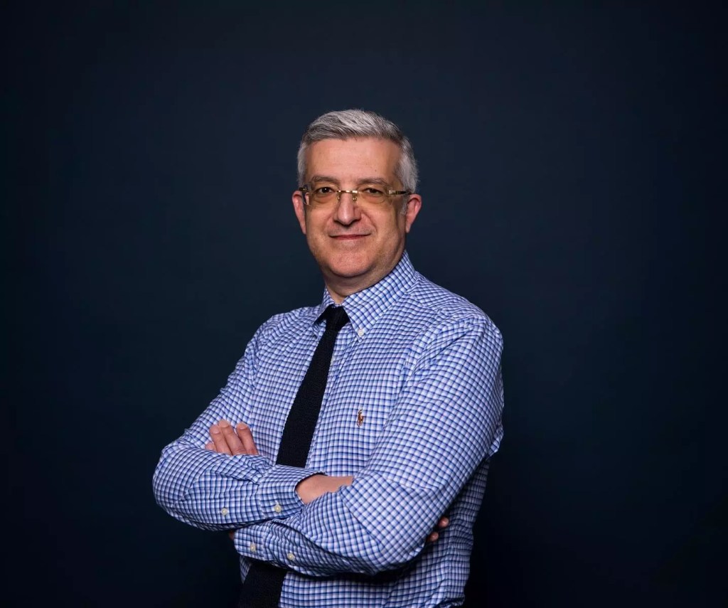 Prof Kyriakos
